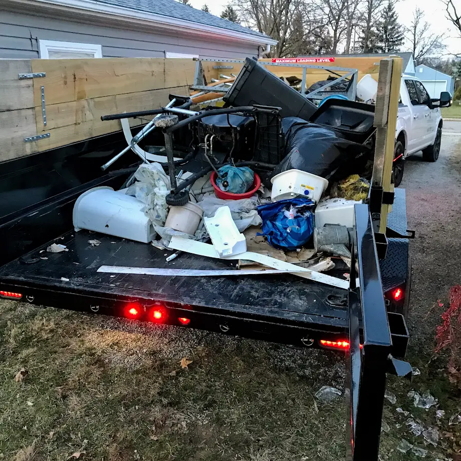 Roll-off dumpster delivered to a residential driveway in Bowie