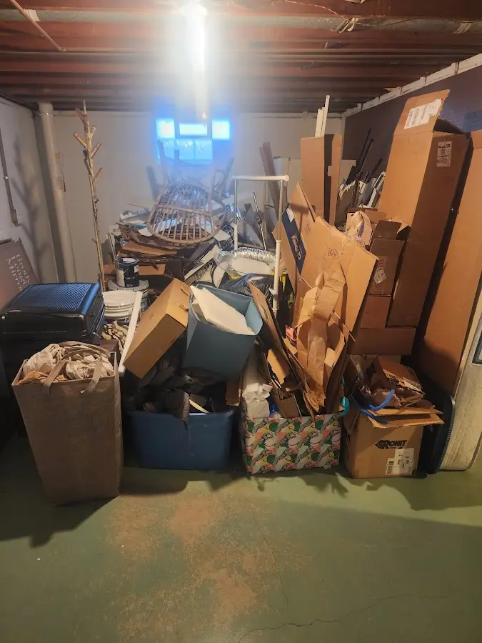 Roll-off dumpster container at job site for 2 Yard Dumpster Rental in Bowie